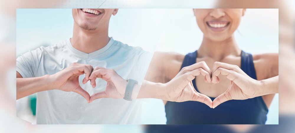 二人以手擺出心形圖案的圖片